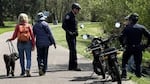 FILE - Eugene Police stop an e-bike rider on April 8, 2026.