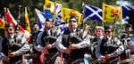 Bagpipers play the Welcome Ceremony at the Portland Highland Games in Gresham, Oregon, Saturday, July 15, 2017.