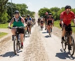 Marley Blonsky, left, leads a group ride during the 2021 Unbound Gravel event in Emporia, Kansas.