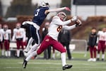 Central Catholic wide reciever Silas Starr (8) catches a pass while under pressure from Lake Oswego's Joe Hutson (3). The Central Catholic Rams played the Lake Oswego Lakers at Hillsboro Stadium in Hillsboro, Oregon, on Dec. 7, 2019. The Rams defeated the Lakers 49-28.