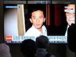 A TV screen shows a file image of Ri Il Kyu, a senior North Korea diplomat based in Cuba, during a news program at Seoul Railway Station in Seoul, South Korea, on Tuesday. South Korea's spy agency said Ri has fled to South Korea, the latest in a series of defections by members of the North's ruling elite in recent years. 