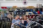 Friends Tari Donohue, left, and Karen McCarthy, right, purchase clothing with donated funds, shopping at Bi-Mart in Madras.
