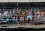 People clap to make noise as they participate in a civil disobedience action to protest against the military coup in Yangon, Myanmar, Tuesday, Feb. 4, 2021.