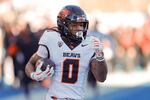 FILE - Oregon State running back Anthony Hankerson (0) breaks away on a 83 yard touchdown run against Boise State in the first half of an NCAA college football game, Friday, Nov. 29, 2024, in Boise, Idaho.