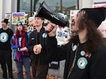 Striking Starbucks worker Kyle Trainer uses a megaphone outside of a Starbucks coffee shop during a national strike on November 17, 2022 in San Francisco, California.