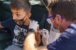A boy gets a flu shot in California in October 2020. This spring, Oregon state public health officials are reporting an increase in the percent of positive flu tests for the fourth week in a row.