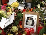Flowers and personal tributes outside David Bowie's former home in Berlin left by fans soon after his death in January 2016.