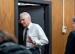 Robert Atrops waves to his family as he exits the courtroom at the Washington County Courthouse in Hillsboro, Ore.,  March 6, 2025. 