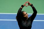 Serena Williams motions a heart to fans after losing to Australia's Ajla Tomljanovic during the third round of the U.S. Open tennis championships on Friday in New York.