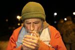 One of the defendants of last fall's trial, Neil Wampler, takes a smoke break during the meeting in John Day.