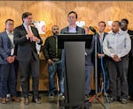 Gov. Bob Ferguson speaks about the financial fallout from tariffs at the Northwest Harvest food bank in Seattle.