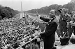 The civil rights leader Martin Luther King Jr. waves to supporters on Aug. 28, 1963, on the Mall in Washington, D.C., during the March on Washington.