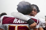 Central Catholic players celebrate the win. The Central Catholic Rams played the Lake Oswego Lakers at Hillsboro Stadium in Hillsboro, Oregon, on Dec. 7, 2019. The Rams defeated the Lakers 49-28.