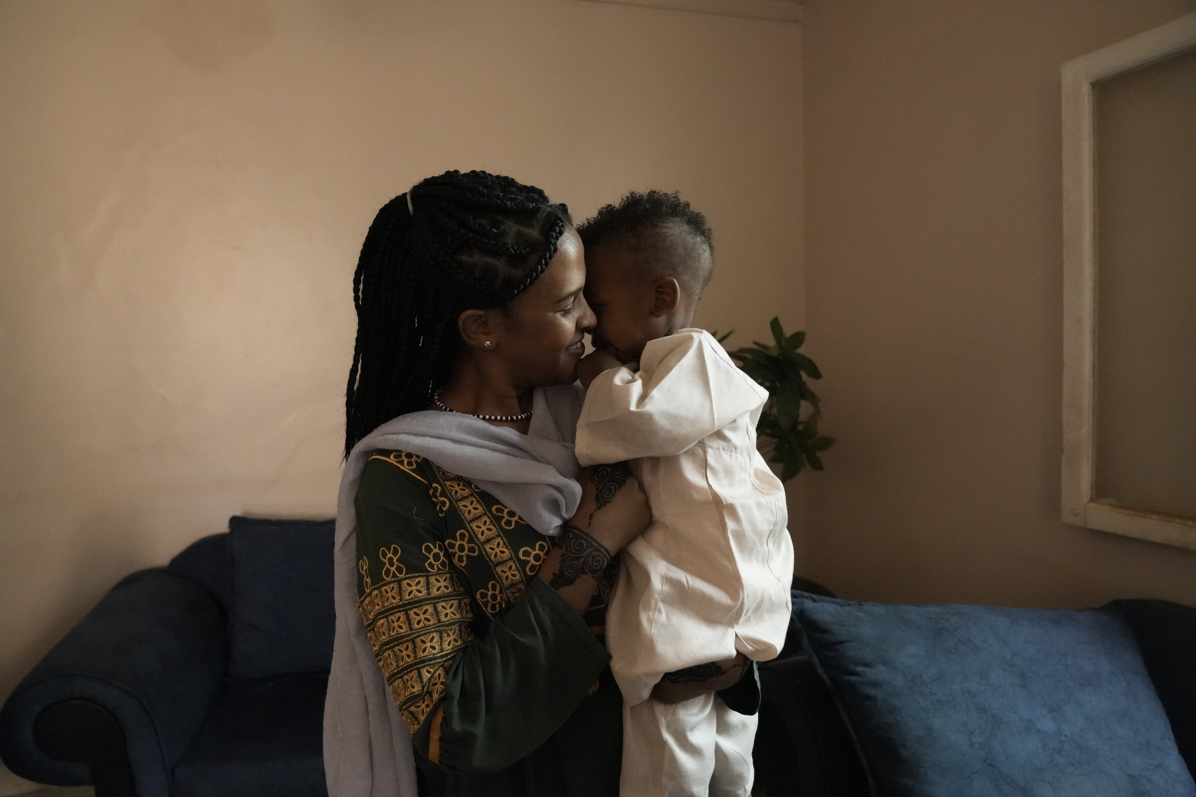 Duaa Tariq, photographed with her 1-year-old son, stayed in Khartoum during the war. She's an activist with Emergency Response Room, a grassroots network of activists and volunteers providing support to local communities.