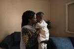 Duaa Tariq, photographed with her 1-year-old son, stayed in Khartoum during the war. She's an activist with Emergency Response Room, a grassroots network of activists and volunteers providing support to local communities.