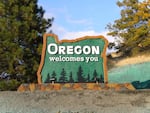 A road sign in southern Oregon welcomes people to the state