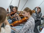 A children's orchestra rehearses for the Kharkiv Music Festival in the Kharkiv State Academic Opera and Ballet Theatre on May 26.