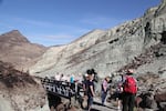 Dozens of people came to the John Day Fossil Beds Saturday to celebrate three anniversaries, including its discovery 150 years ago, its establishment as a national monument 40 years ago, and its visitors center, which was built 10 years ago.