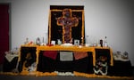 Monarch butterflies play a role in Día de los Muertos celebrations. A Portland altar displays them prominently.