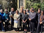 Helen Ying, center, stands next to Multnomah County Chair Jessica Vega Pederson in a family photo with the county's commissioners, Metro Acting President Duncan Hwang and members of the local Chinese American community, after Vega Pederson and commissioners have delivered an apology for the county's past wrongdoing on Block 14, at Lone Fir Cemetery in Portland, Ore., on April 4, 2026.