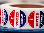 "I voted early" stickers are seen at a polling station on Oct. 25 in Milwaukee.