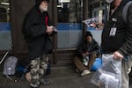 Mike Dusek, an unhoused person living in Portland, distributes hygiene supplies to other members of the unhoused community on March 28, 2020 in Portland, Oregon. 