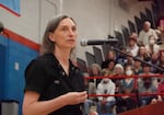 U.S. Rep. Maxine Dexter addresses a crowded town hall at Centennial High School in Gresham, Ore., on March 1, 2025. Town halls have garnered national attention since President Donald Trump's second term began.