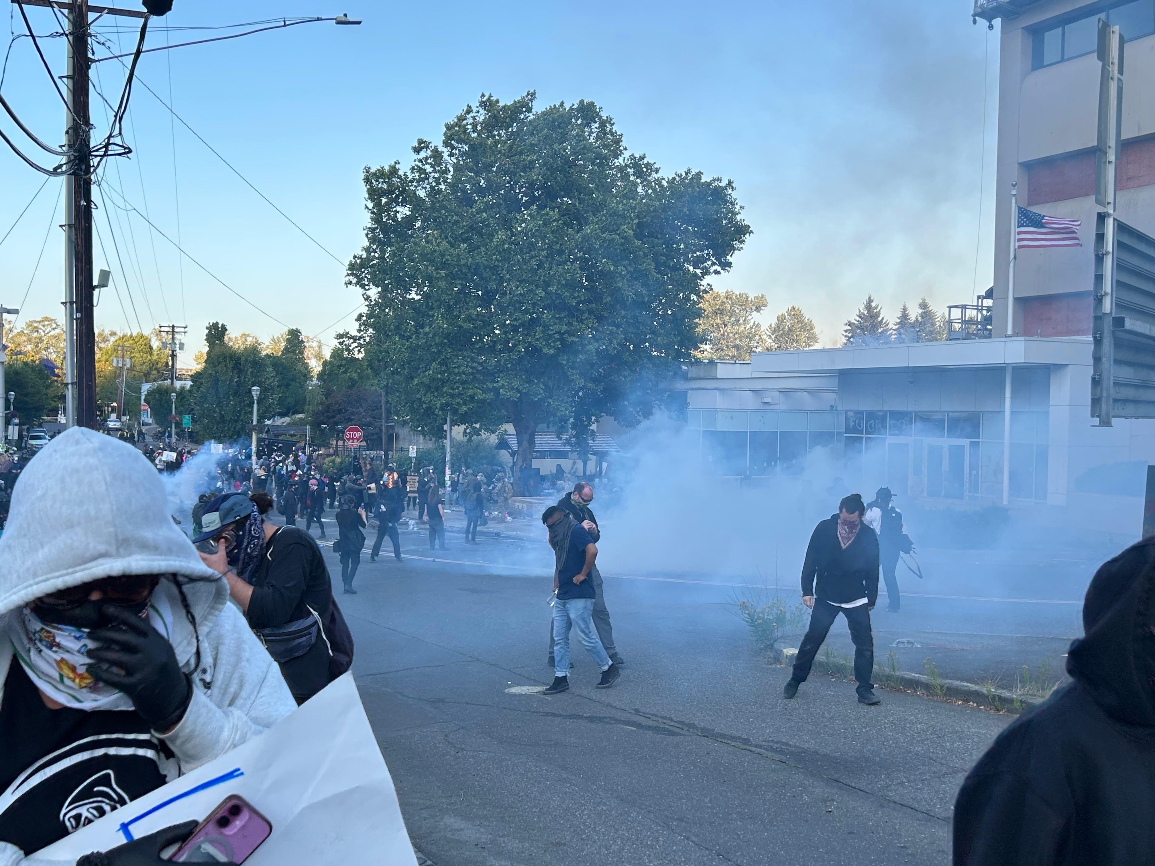 Department of Homeland Security officers deploy crowd control munitions, including tear gas, at a demonstration outside the Portland ICE building on June 14, 2025.