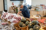 A volunteer at the Clark County Food Bank is shown preparing produce and other food for distribution in Oct. 2024 at the nonprofit's pantry in Northeast Vancouver. The food bank has seen an increased demand in recent weeks from clients at risk of losing their SNAP benefits as a result of the Trump administration's announcement that it would not fund the SNAP benefit during the federal government shutdown.