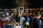 People shop at Hidden Worlds bookstore on Saturday, Sept. 19, 2026.