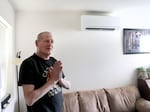 Shawn Heren, 55, is a St. Vincent de Paul resident that received a heat pump unit through the Oregon’s Rental Heat Pump Program. Previously he had a window unit that was not sufficient to cool. Now, he’s thankful he was able to qualify for one through the program and feels more comfortable at home. “It does it fast, efficiently, and actually you're cold in here, instead of barely and the heat is amazing,” he said. Pictured on March 27, 2025.