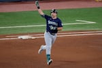 Seattle Mariners' Cal Raleigh celebrates his solo home run off Toronto Blue Jays pitcher Louis Varland during the fifth inning in Game 7 of baseball's American League Championship Series, Monday, Oct. 20, 2025, in Toronto.