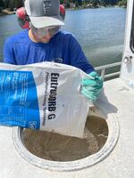 Crews mix the material lanthanum with clay. It then binds to phosphorus to sequester it deep in the lake. Phosphorus is a main driver of harmful algal blooms in Moses Lake.