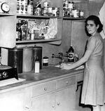 A Vanport resident in her kitchen.