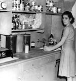 A Vanport resident in her kitchen.