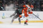 Seattle Kraken right wing Eeli Tolvanen (20) collides with Anaheim Ducks left wing Cutter Gauthier, right, during the third period of an NHL hockey game Friday, Jan. 23, 2026, in Seattle.
