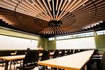 One of the classrooms on the first floor of the Vernier Science Center has a ceiling lined with wooden planks to replicate the inside of a drum.