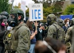 Federal officers confront protesters at the U.S. Immigration and Customs Enforcement facility, Portland, Ore., Oct. 4, 2025.