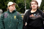 Kovi Stevens (left) and Lydia Johnston outside Tongue Point Job Corps Center in Astoria, Ore. on June 5, 2025. Both face an uncertain future as the federal government plans to close the center.