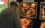 FILE - The opening of the Cascade Underground Pinball Society in Eugene on Dec. 4, 2025. Hayden Harker, the nonprofit’s board president, said he wants enthusiasts to come there to practice, take classes, watch national tournaments and potentially even livestream their own gameplay.