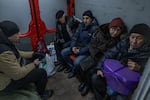 Residents of Pokrovsk inside the armored evacuation minivan before evacuation from town.