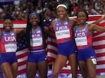 United States women's 4x100-meter relay final team pose for a photo after winning the gold medal at the 2024 Summer Olympics on Friday in Saint-Denis, France.