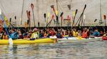 Kayakers on the Willamette River raised their paddles in protest of Shell's Arctic oil drilling efforts, July 25, 2015, in Portland.