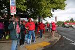 Striking Battle Ground teachers wave picket signs outside Battle Ground High School. The teachers have been on strike since Aug. 29.