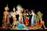 Miss Trans Global's contestants pose in their national costumes. Chedino said her feet were causing her so much pain that she'd returned to her dressing room to rest and missed out on the final group photo.