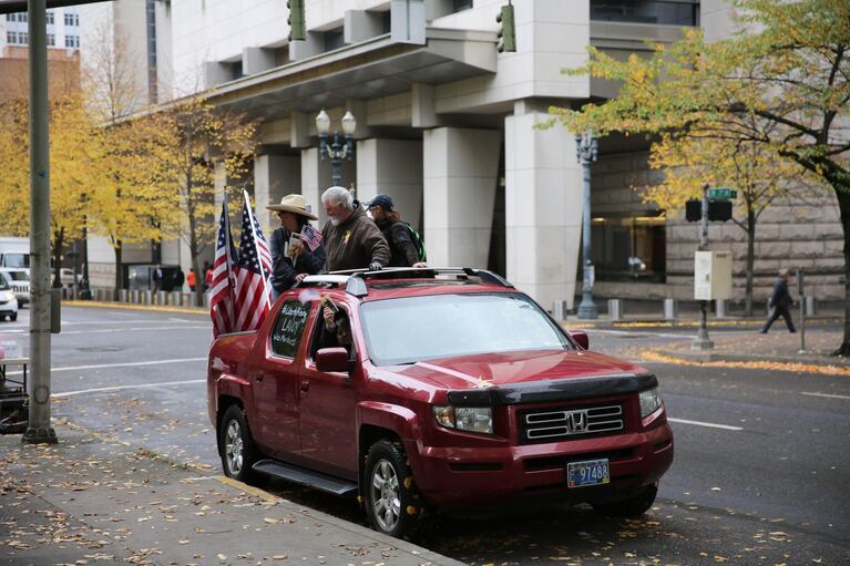 Bundy supporter Brand Nu Thornton blew his shofar in the back of a pickup truck, circulating the streets of downtown Portland.