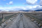 In this March 2010 photo, an irrigation ditch stands dry on the Klamath Irrigation District near Klamath Falls, Oregon.
