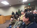 Greg Delgado listens as the "Not In Our Town" proclamation is read at a December meeting of the Bend City Council.