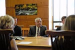 Coquille Superintendent Tim Sweeney speaking with Oregon Gov. Kate Brown at the Capitol on March 19, 2019.