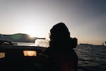 Jan Cortsen drives the boat to head closer to icebergs.